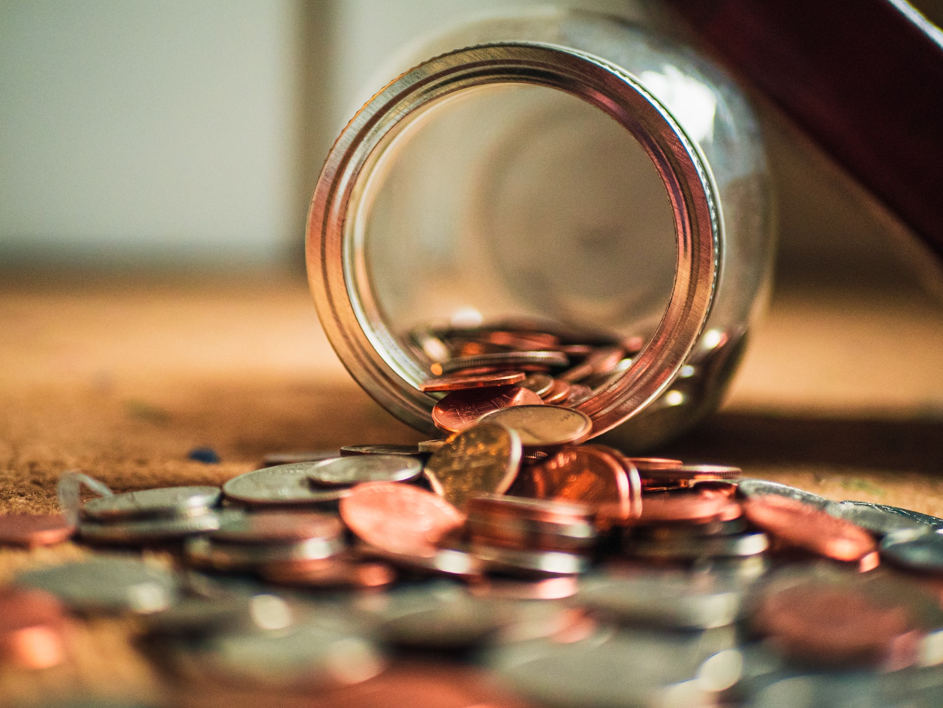 josh-appel-NeTPASr-bmQ-unsplash Jar of coins