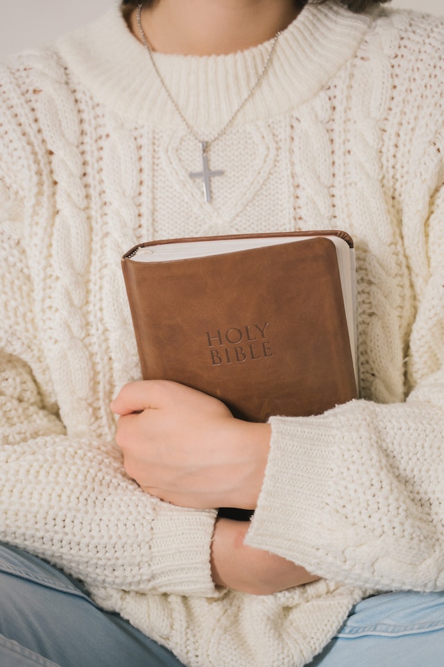 woman holding bible