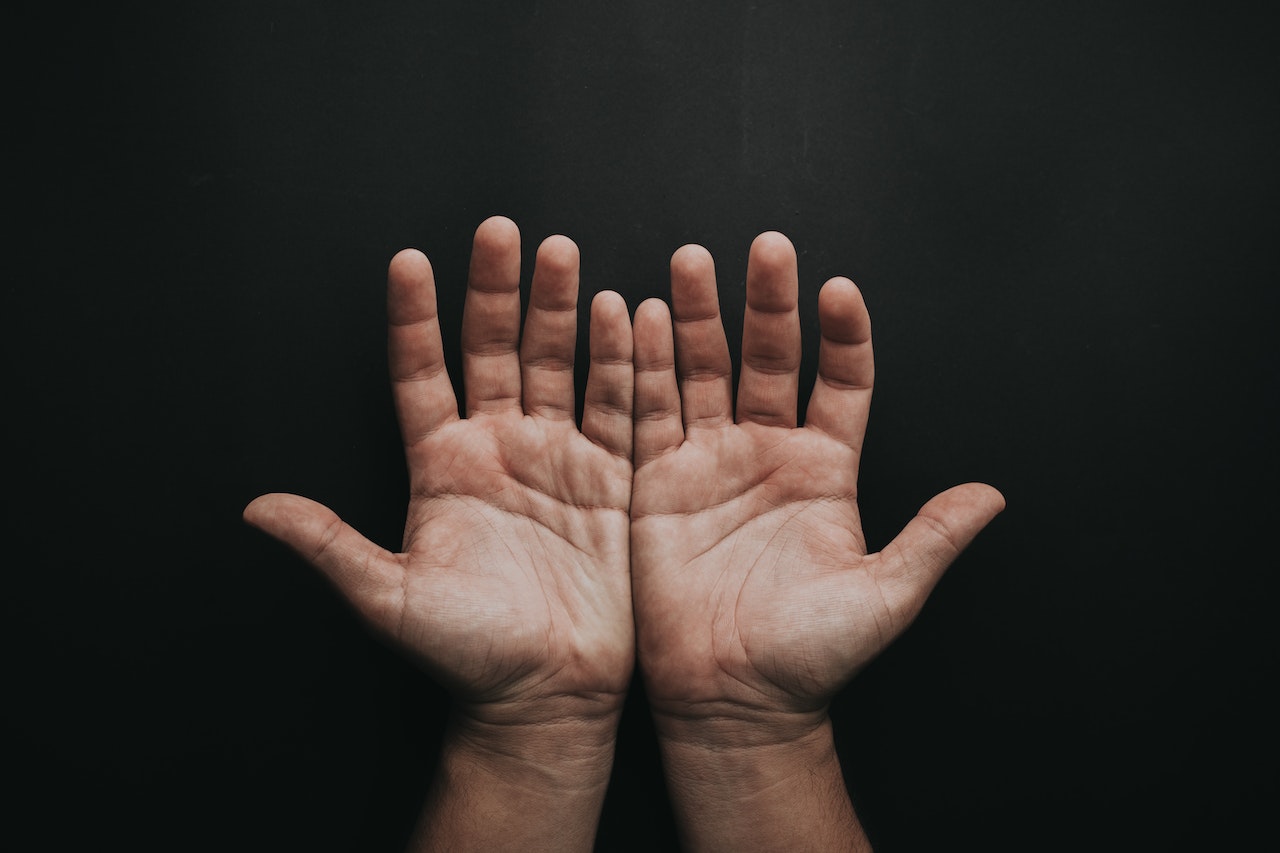 holding out hands holding out hands